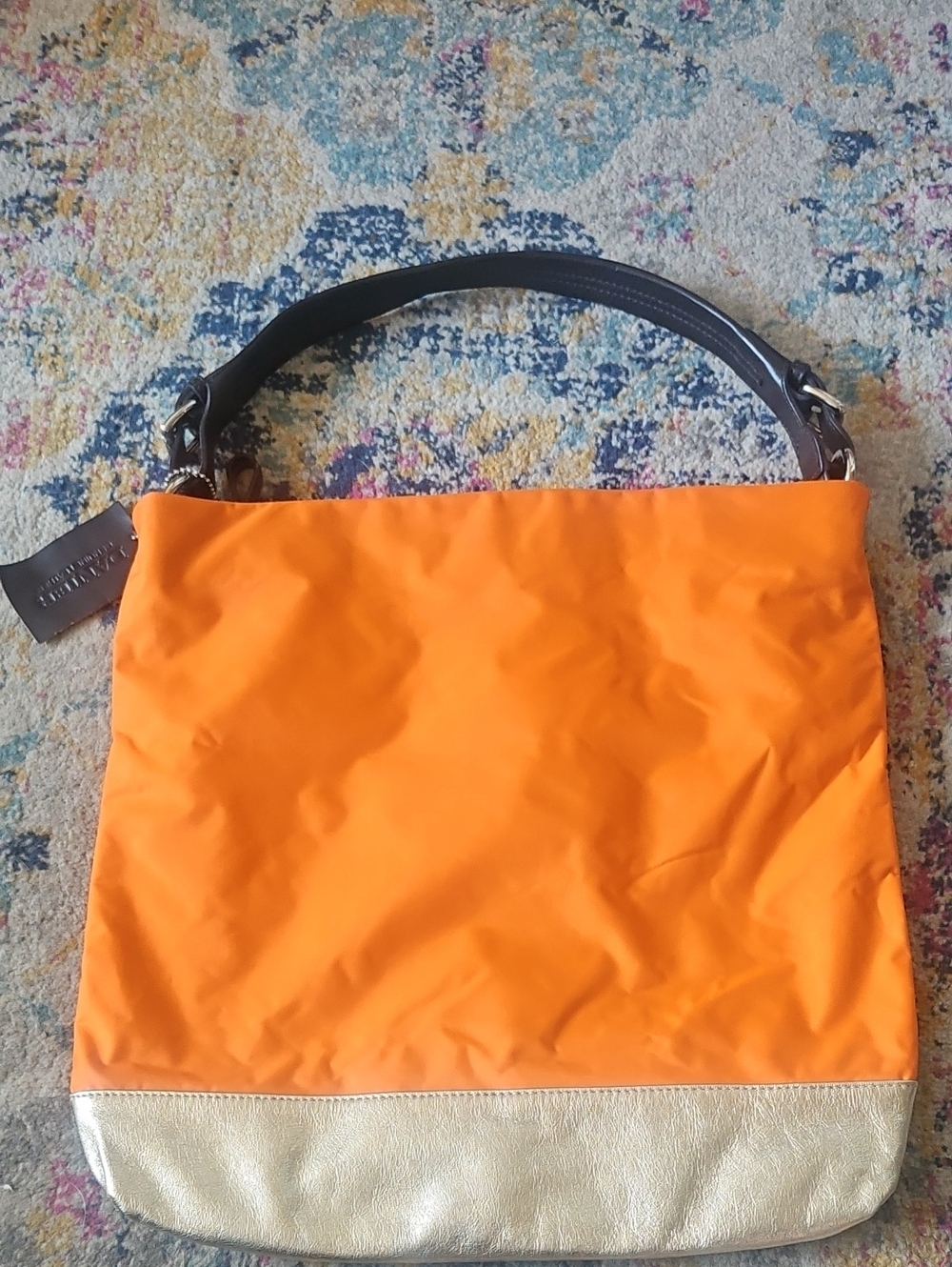 Danier Orange Nylon Shoulder Bag with Brown Handle and Gold Base